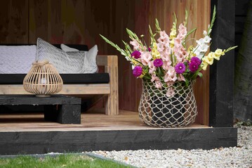 Organische Formen und unkomplizierte Floristik wie auf diesem Motiv zum Groenbranche-Trend "Harvesting elements" passen zum Landhausstil 2.0.